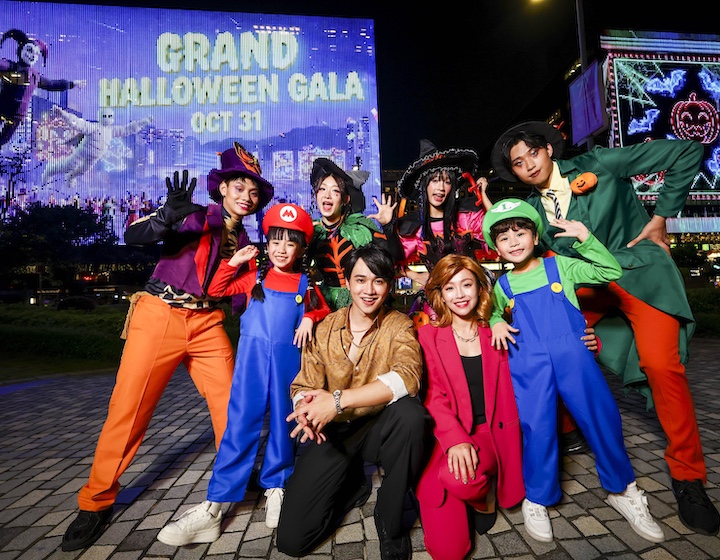 a family dressed up in halloween costumes for the cosplay carnival in Hong Kong
