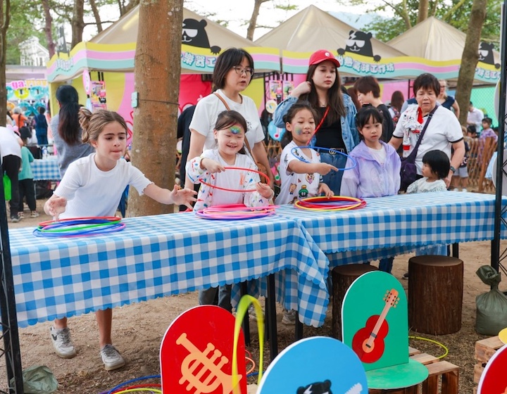 children play games at the hush music festival in Macau