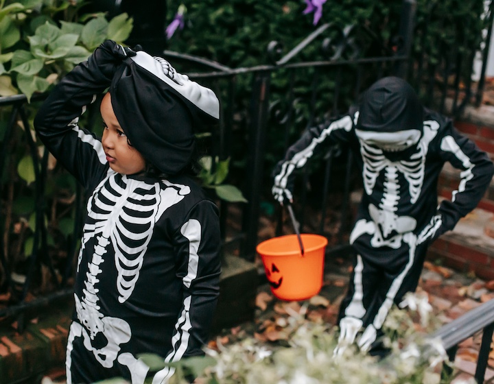 two children dressed up as skeletons for halloween in Hong Kong