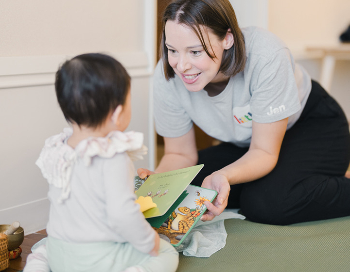 Teacher at Little baby class with a young child, guided playgroups at Little in Hong Kong