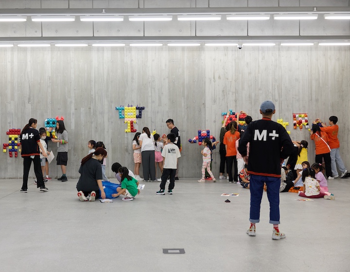 children have fan creating pixel art at a free drop in class at M+ to celebrate its anniversary