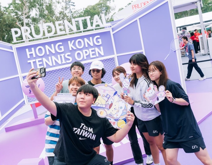 a group of friends gather for a selfie at the Hong Kong tennis open at Causeway Bay