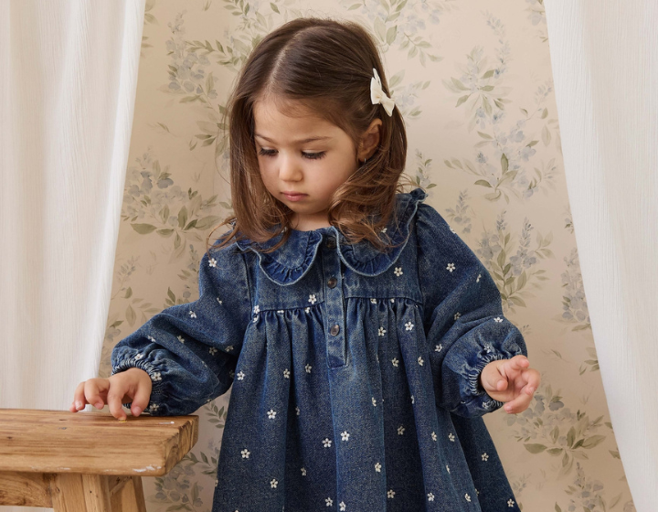 young girl wearing a dress from Jamie Kay, a children's clothing brand available at Mothercare Hong Kong