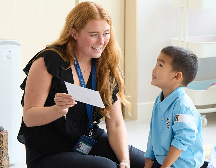 child and teacher at Harrow Little Lions Kindergarten Open Day School Tour